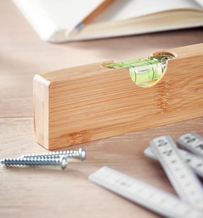 Spirit level made from bamboo with a built-tin bottle-opener