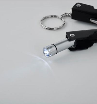 Foldable multi-tool knife with flashlight